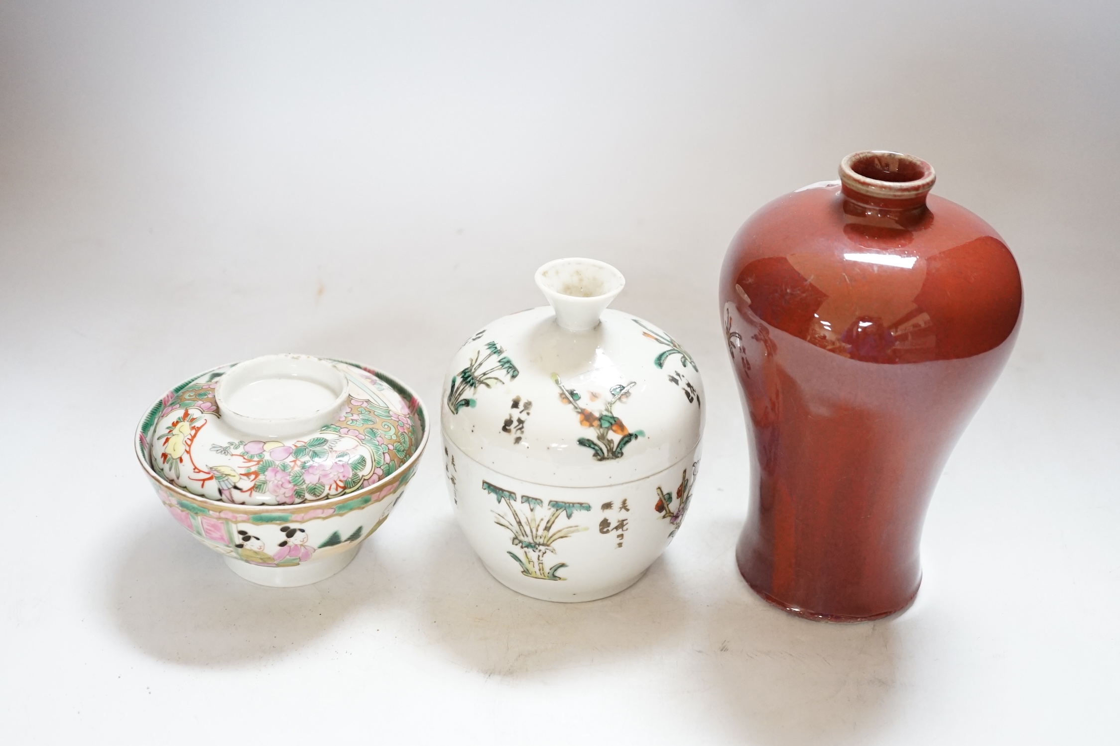 A Chinese sang de boeuf vase, 17.5cm high, and two others